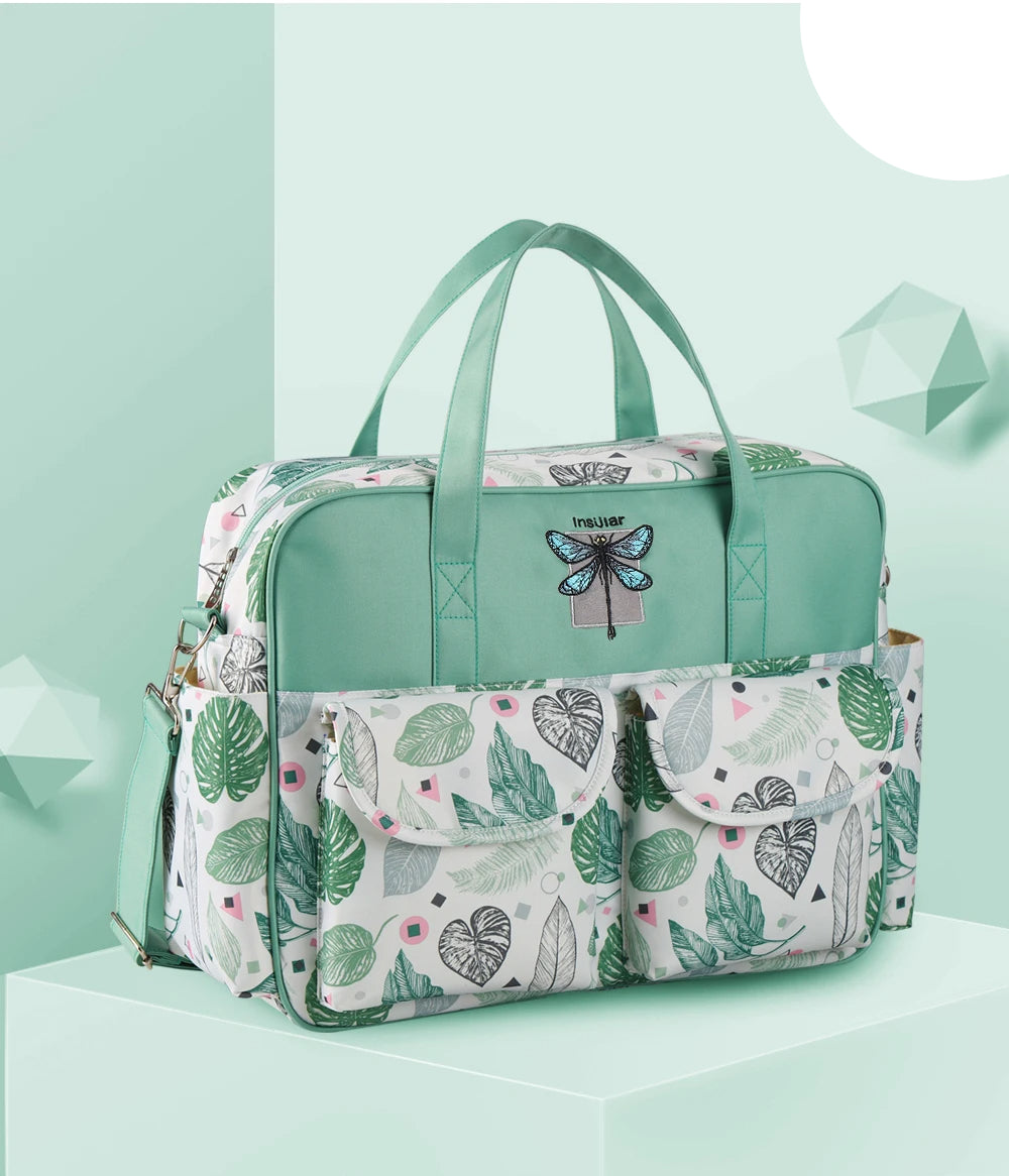 sac-a-langer-de-bebe-en-papillon-vert